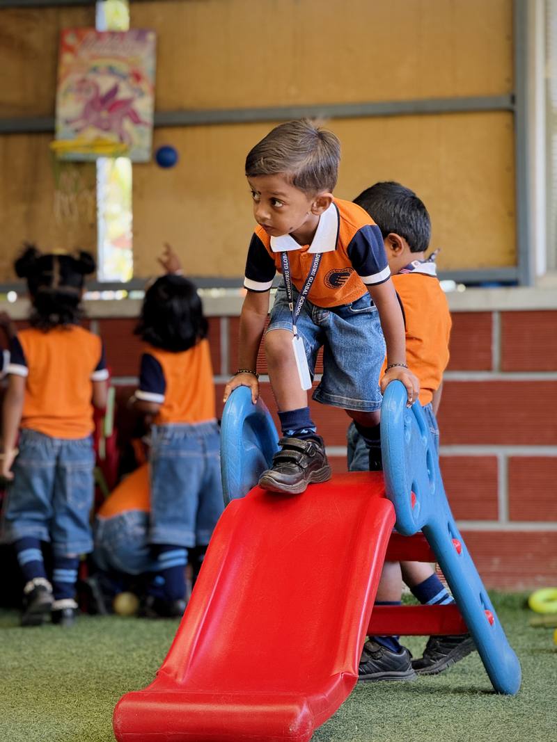 Boy Climbing Slide Sadhguru